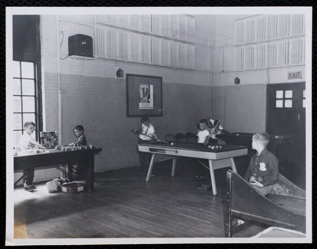 Charlestown Boys Club day campers playing games in the Game Room