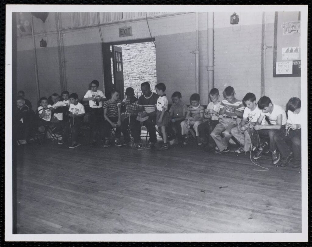 Charlestown Boys Club day campers engaged in arts and crafts