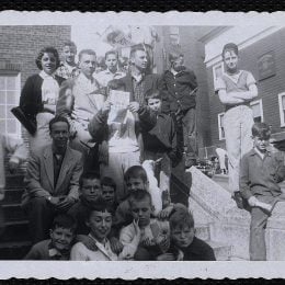 Club members assembled on the front steps of the Charlestown Boys Club (1955)